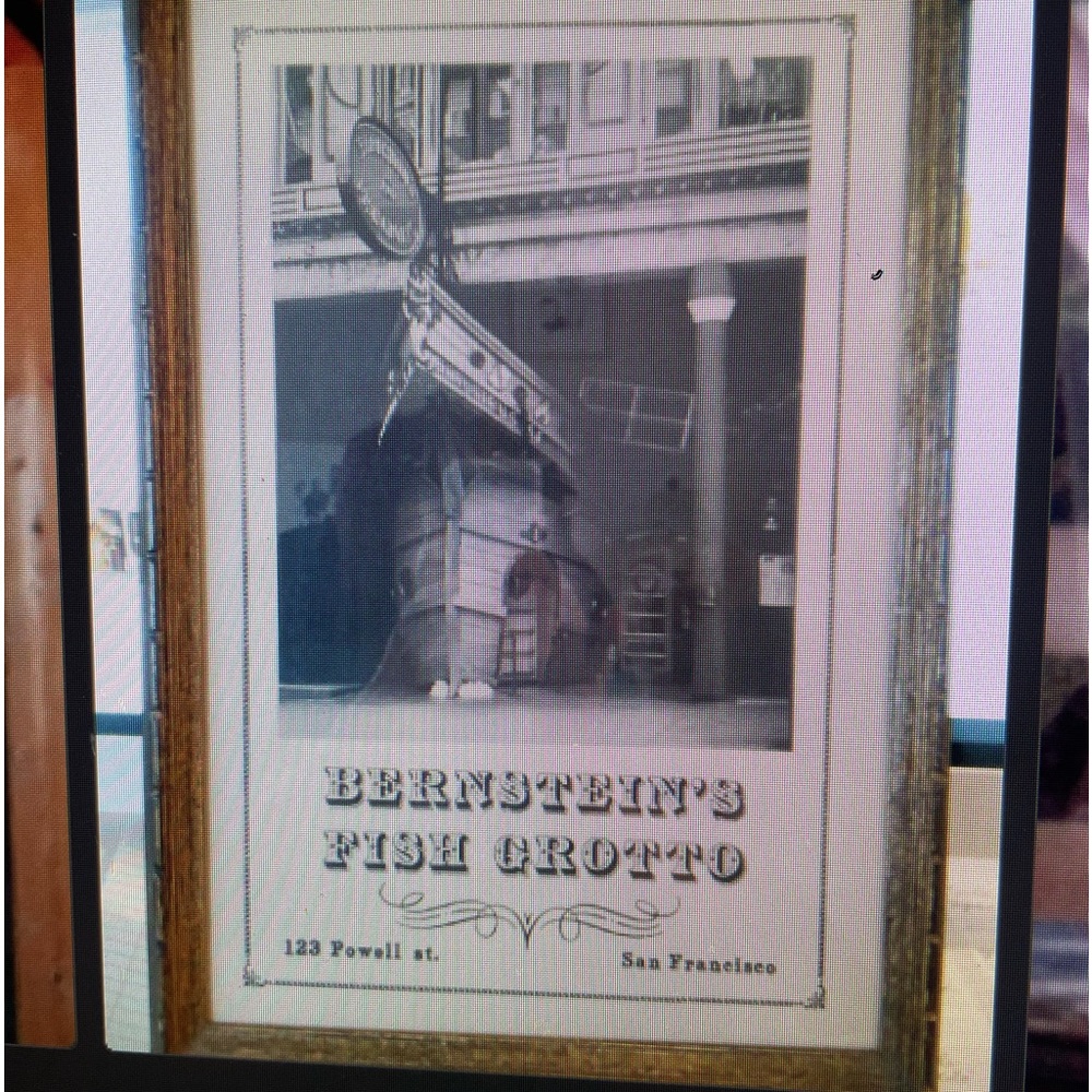 Vintage Bernstein’s Fish Grotto. unique entrance. ships bow jutting on sidewslk.